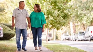 Couple walking in neighborhood