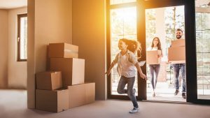 Family entering their new home